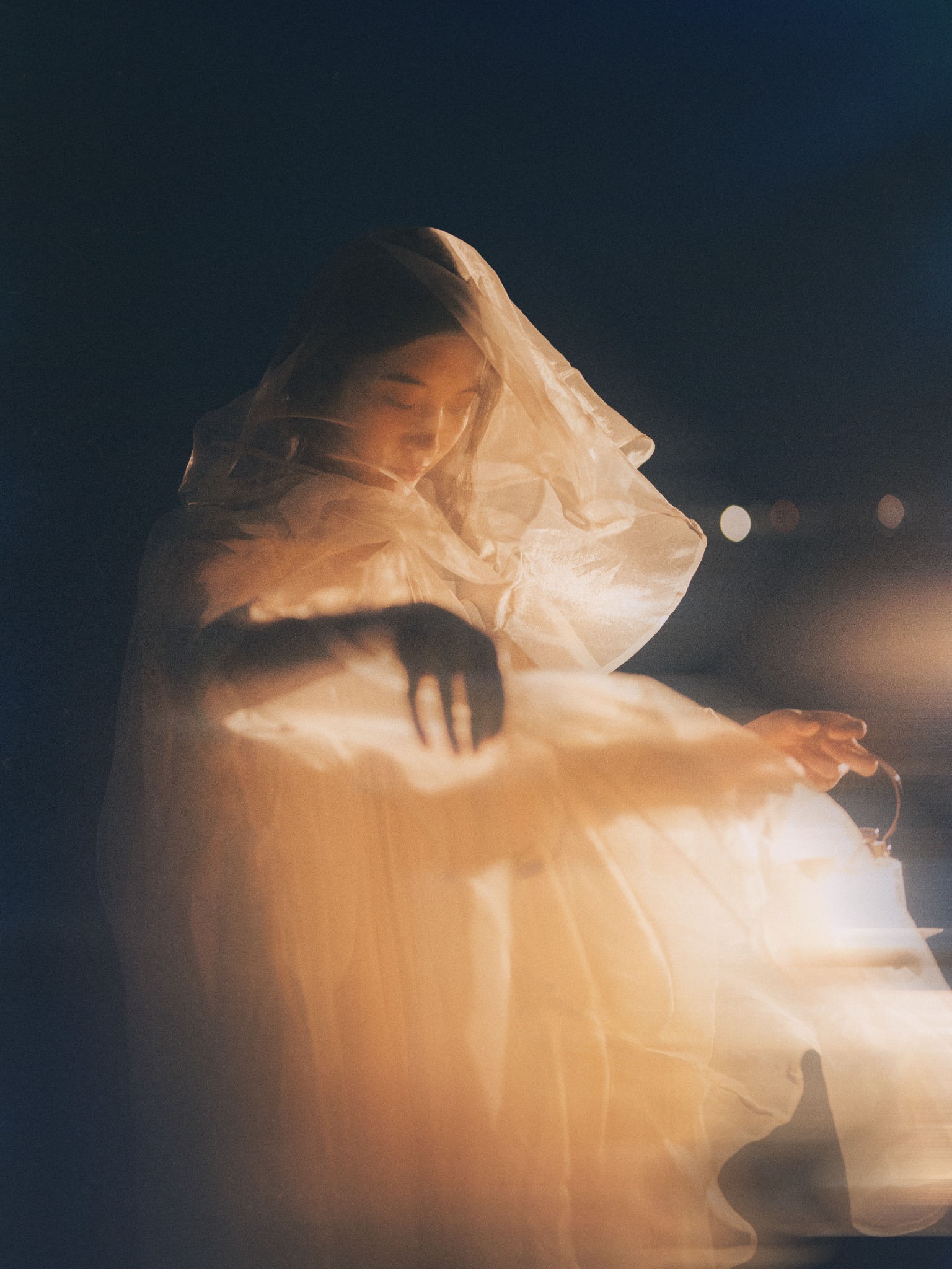 Atmospheric portrait with glowing lantern